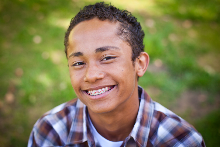 young teen wearing braces