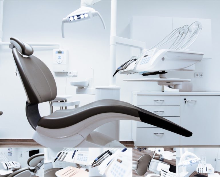 A dental exam chair in a sterilized exam room with detail photos of dental tools underneath